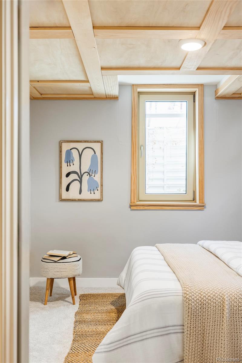 1201 Fairfax Street Denver, CO 80220 - Photo 30 of 40 a bedroom with a bed and a window