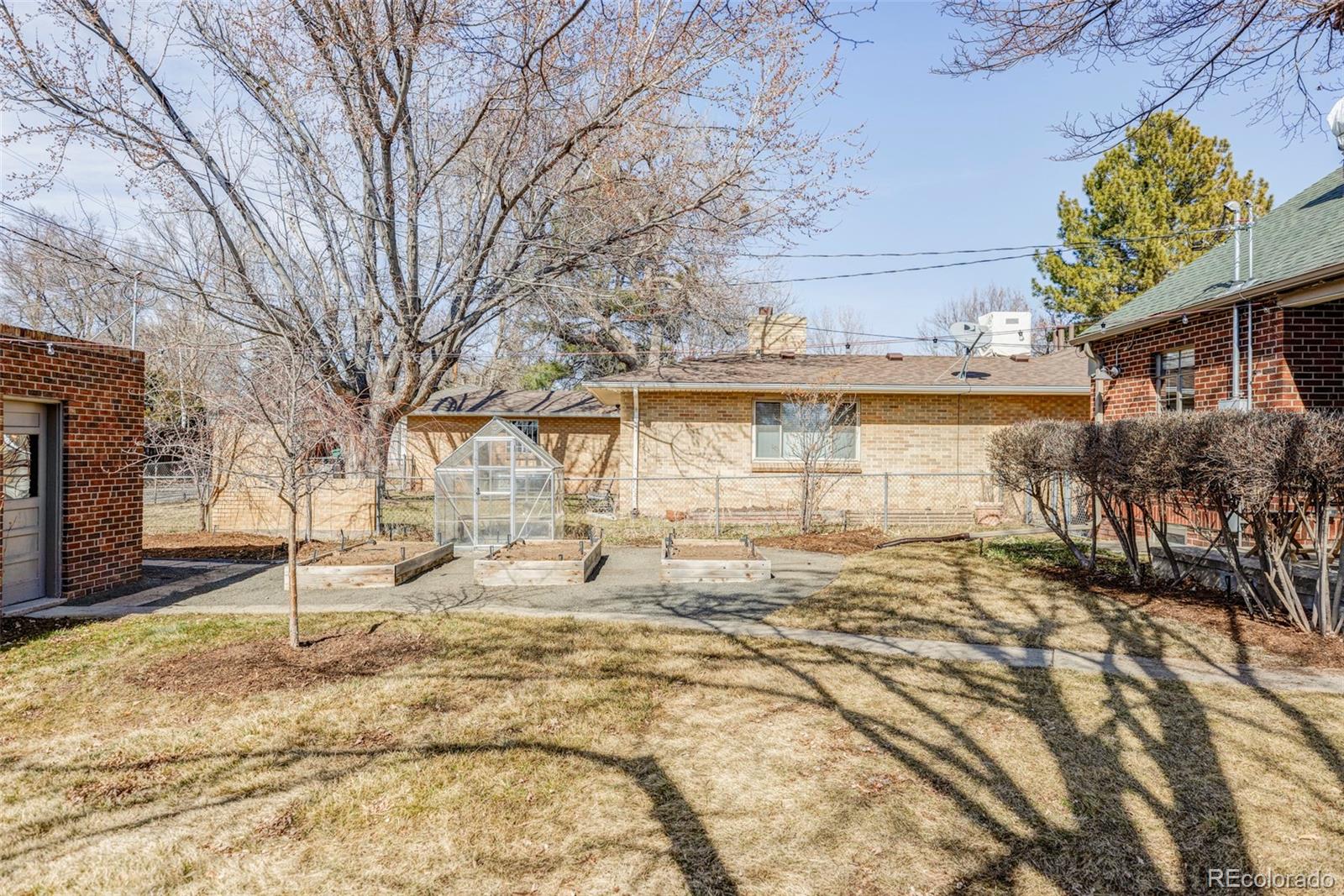 1201 Fairfax Street Denver, CO 80220 - Photo 37 of 40 a view of a yard with chairs