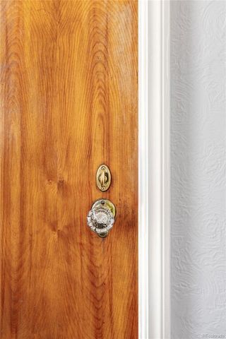 a view of door with wooden floor