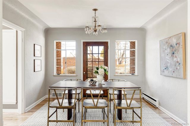 a view of a dining room with furniture window and outside view