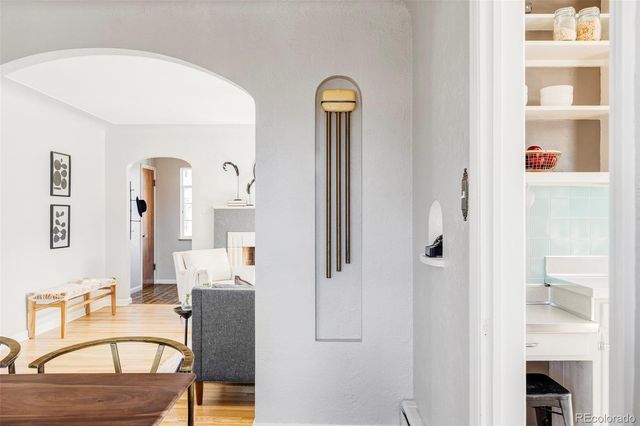 a front view of a house with outdoor seating