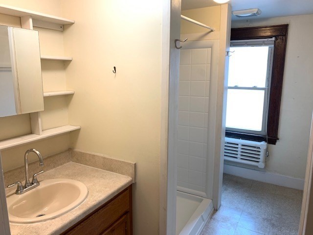 237 Bridge Street Northampton, MA 01060 - Photo 7 of 14 a bathroom with a sink and a mirror