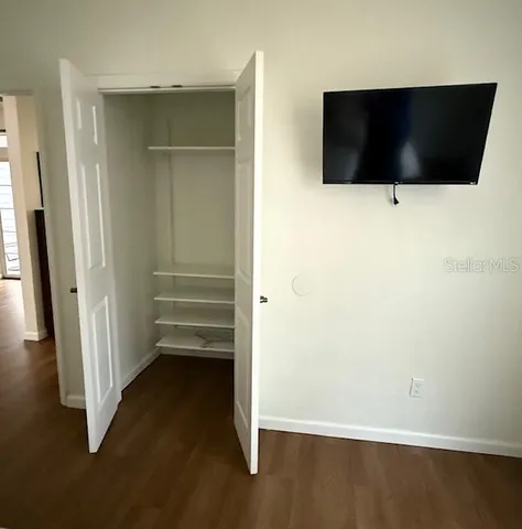 a view of a livingroom with a flat screen tv