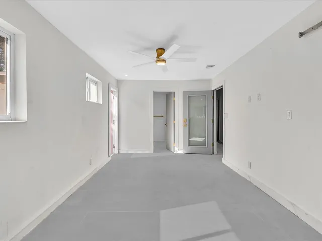 a aerial view of a house with a garden and plants