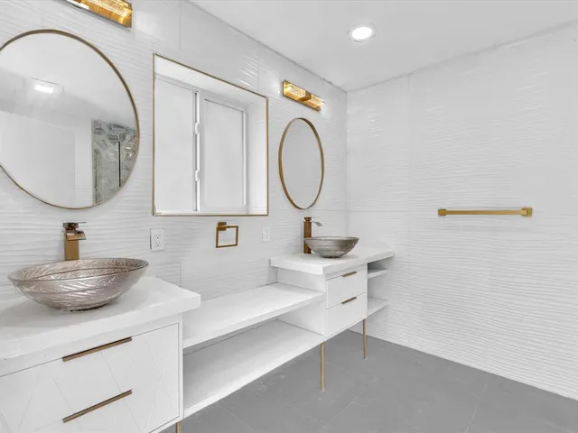 an aerial view of residential building and ocean