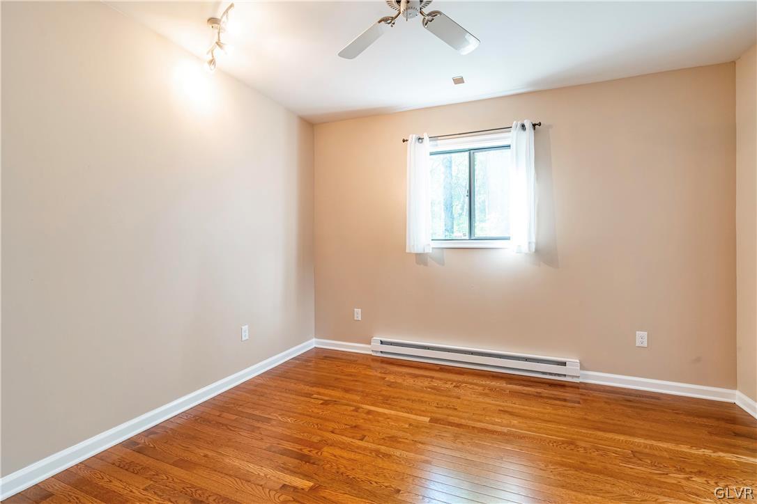 1460 Clover Road Long Pond, PA 18334 - Photo 14 of 25 wooden floor in an empty room with a window