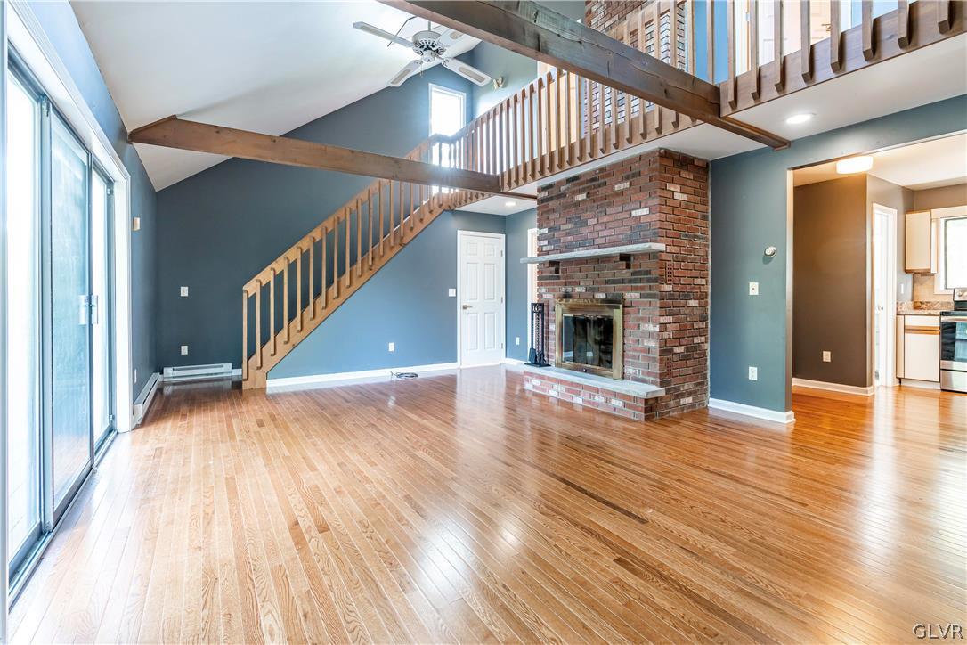 1460 Clover Road Long Pond, PA 18334 - Photo 5 of 25 a view of an entryway with wooden floor fire place