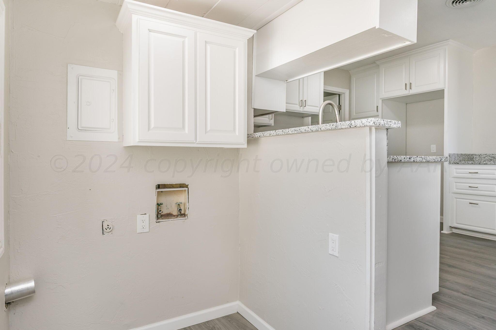 4013 South Jackson Street Amarillo, TX 79110 - Photo 15 of 18 a room with storage and utility