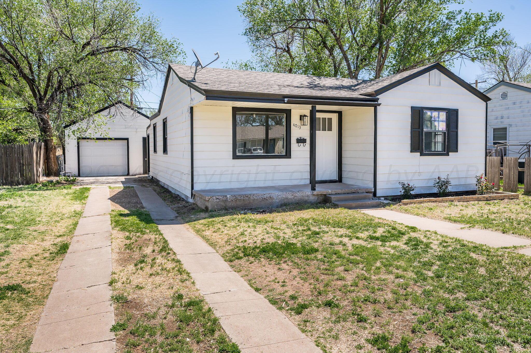 4013 South Jackson Street Amarillo, TX 79110 - Photo 2 of 18 a view of house with yard