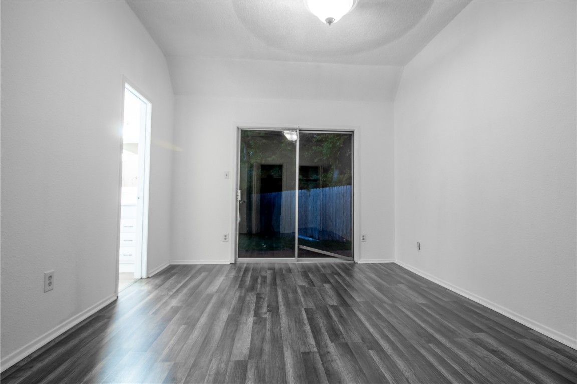 709 Castle Ridge Road, Unit D Austin, TX 78746 - Photo 14 of 19 wooden floor in a empty room
