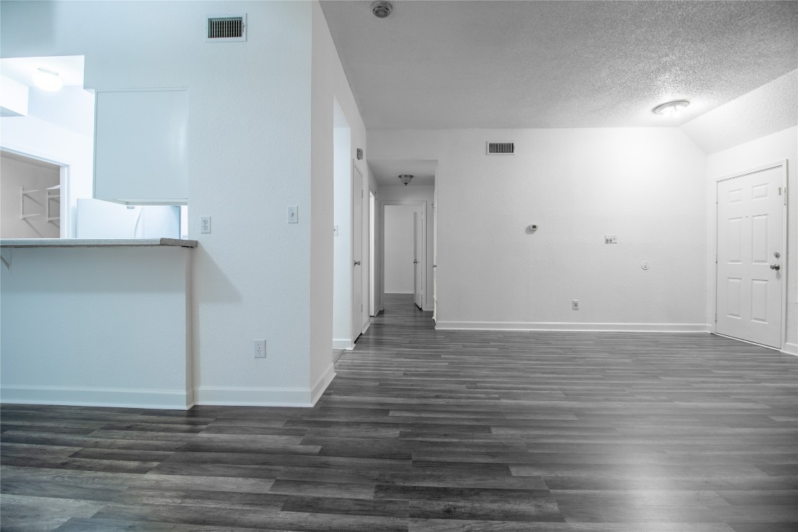 709 Castle Ridge Road, Unit D Austin, TX 78746 - Photo 7 of 19 a view of a livingroom with wooden floor
