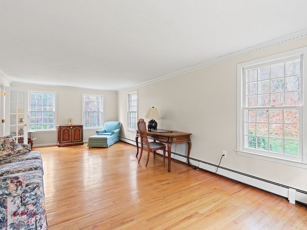 97 Pine Street Medfield, MA 02052 - Photo 13 of 29 a living room with furniture and a wooden floor