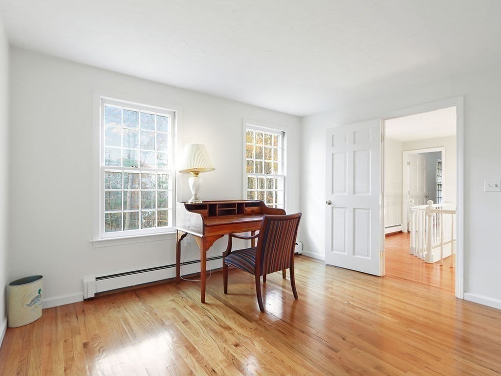 97 Pine Street Medfield, MA 02052 - Photo 20 of 29 a workspace with furniture window and wooden floor