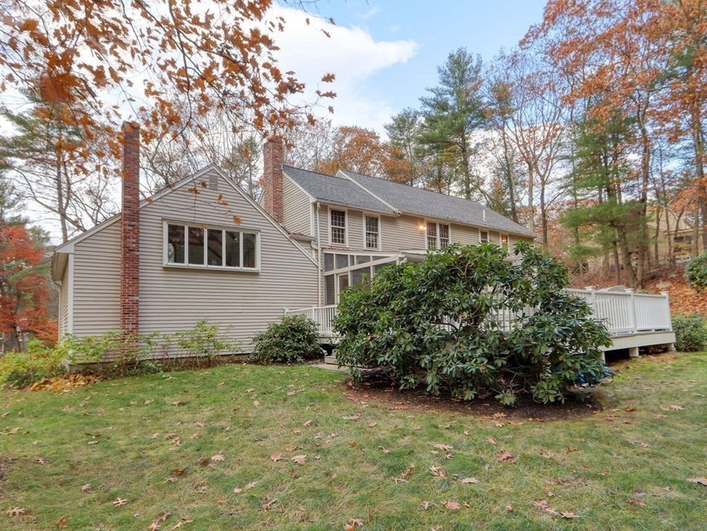 97 Pine Street Medfield, MA 02052 - Photo 27 of 29 a front view of a house with a garden