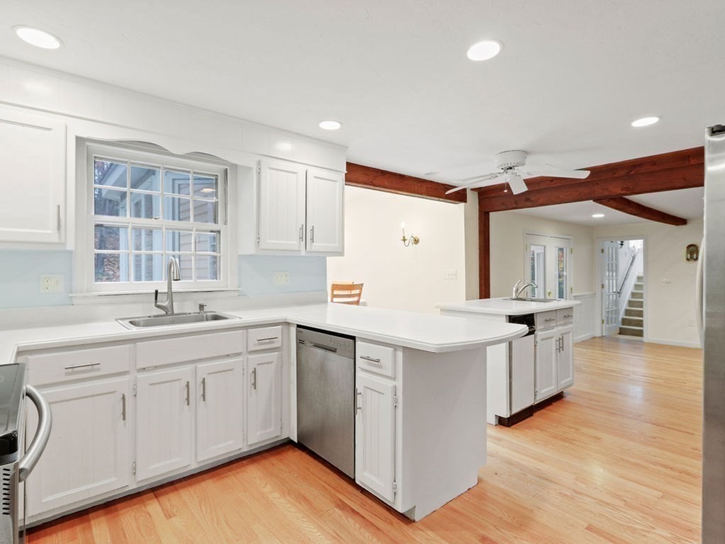 97 Pine Street Medfield, MA 02052 - Photo 6 of 29 a kitchen with a sink and cabinets