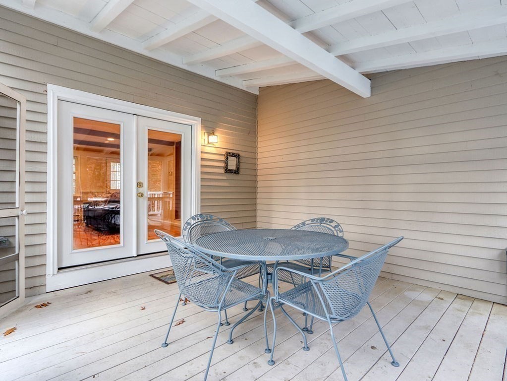 97 Pine Street Medfield, MA 02052 - Photo 10 of 29 a backyard of a house with table and chairs