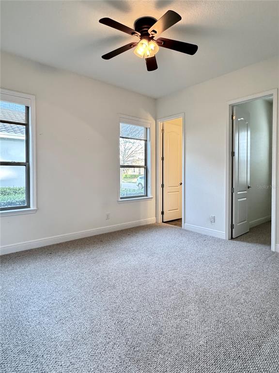 416 Blue Birch Court Sanford, FL 32771 - Photo 21 of 36 a view of empty room with windows