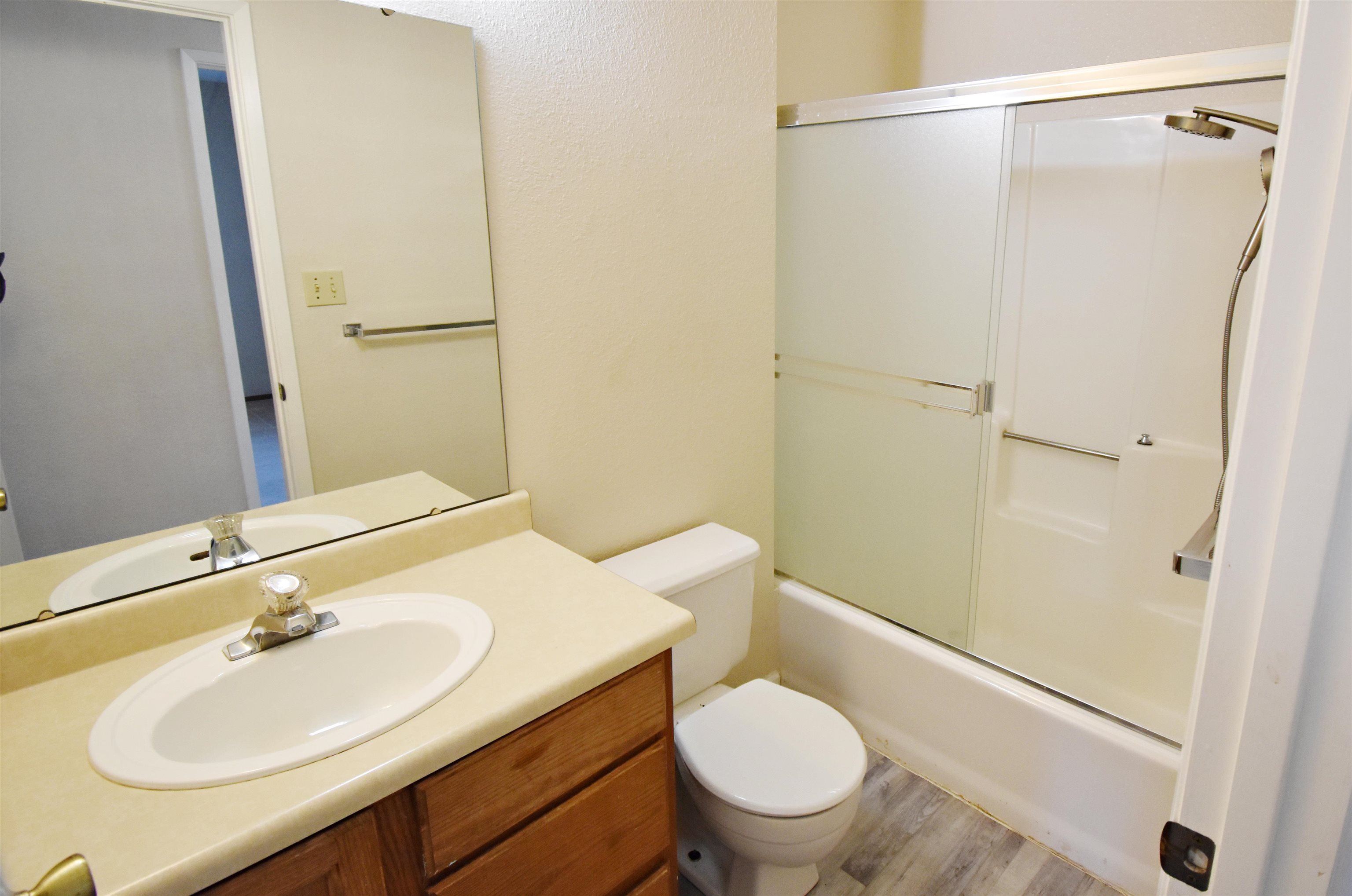 19283 James Circle Groveland, CA 95321 - Photo 20 of 40 a bathroom with a sink toilet and shower