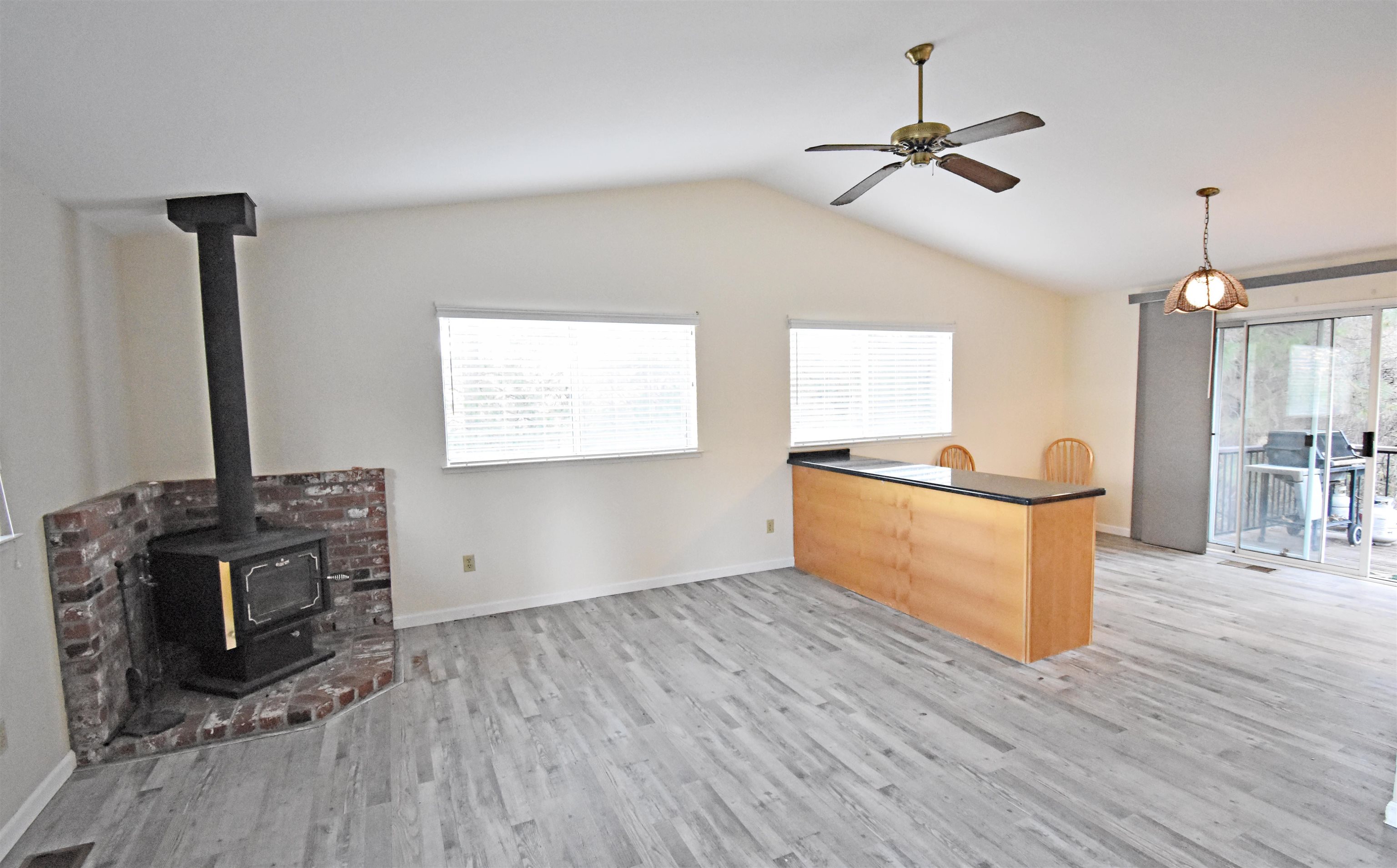 19283 James Circle Groveland, CA 95321 - Photo 6 of 40 a kitchen with stainless steel appliances granite countertop a stove a sink and a wooden floors