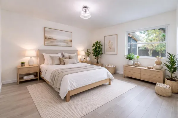 a bedroom with a bed and a couch