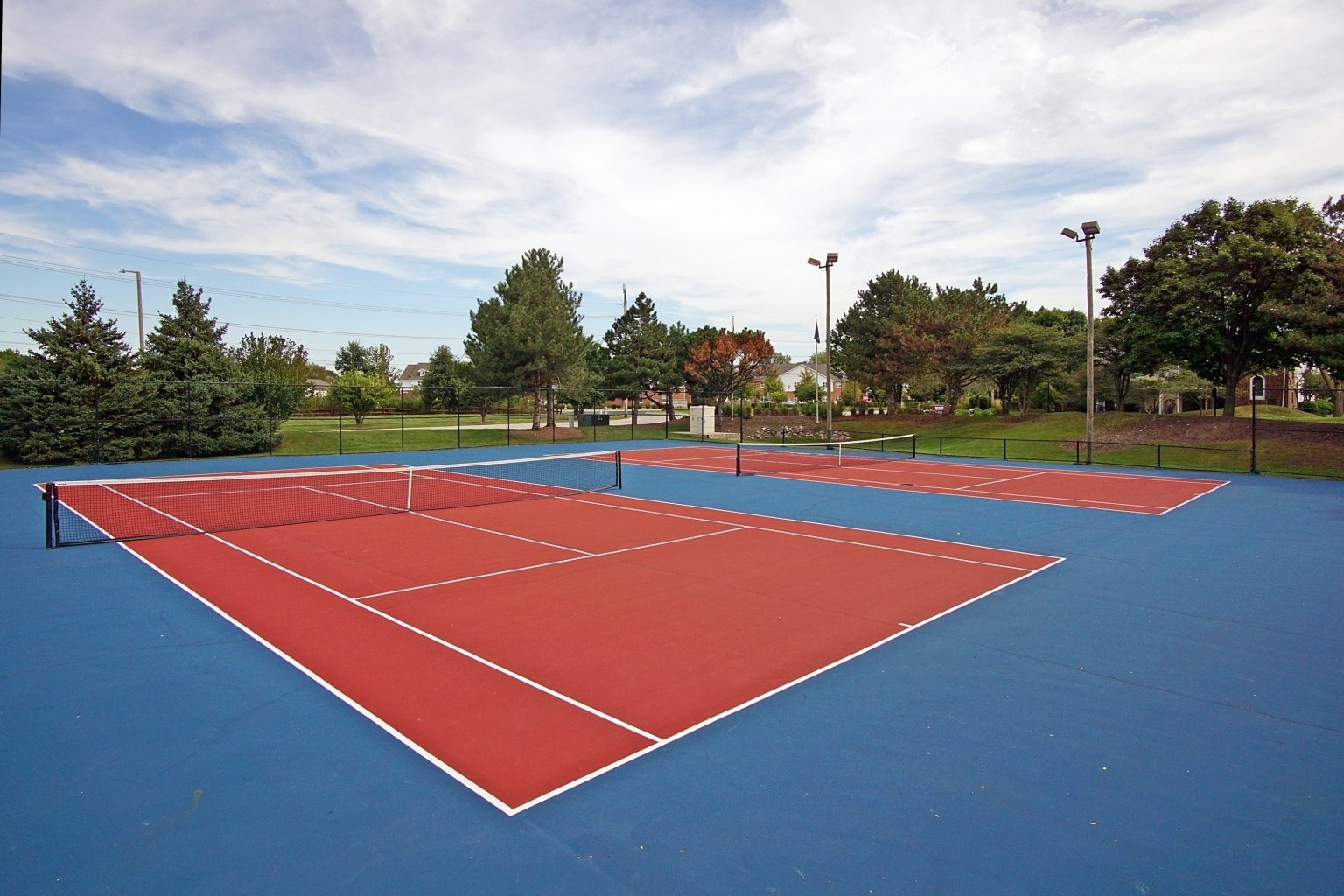 1607 Westminster Drive, Unit 207 Naperville, IL 60563 - Photo 12 of 53 a tennis court that has tennis net