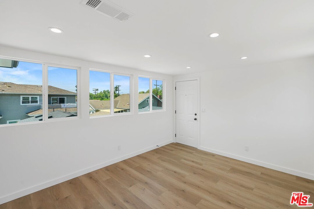 510 East Palmer Avenue Glendale, CA 91205 - Photo 6 of 26 a view of empty room with wooden floor and fan