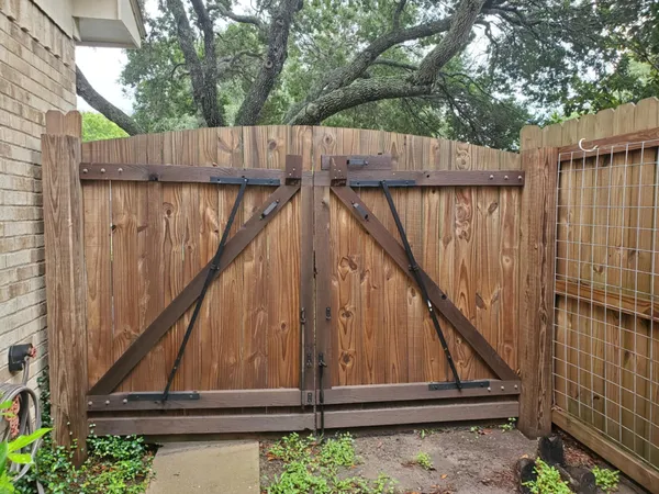 a backyard of a house with lots of green space