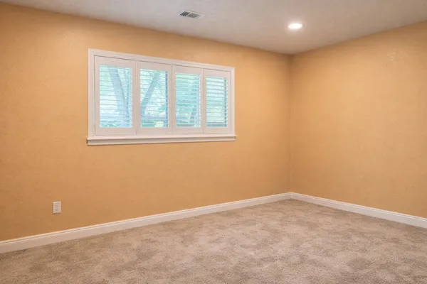 an empty room with a window