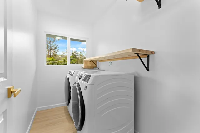 a view of entryway with wooden floor