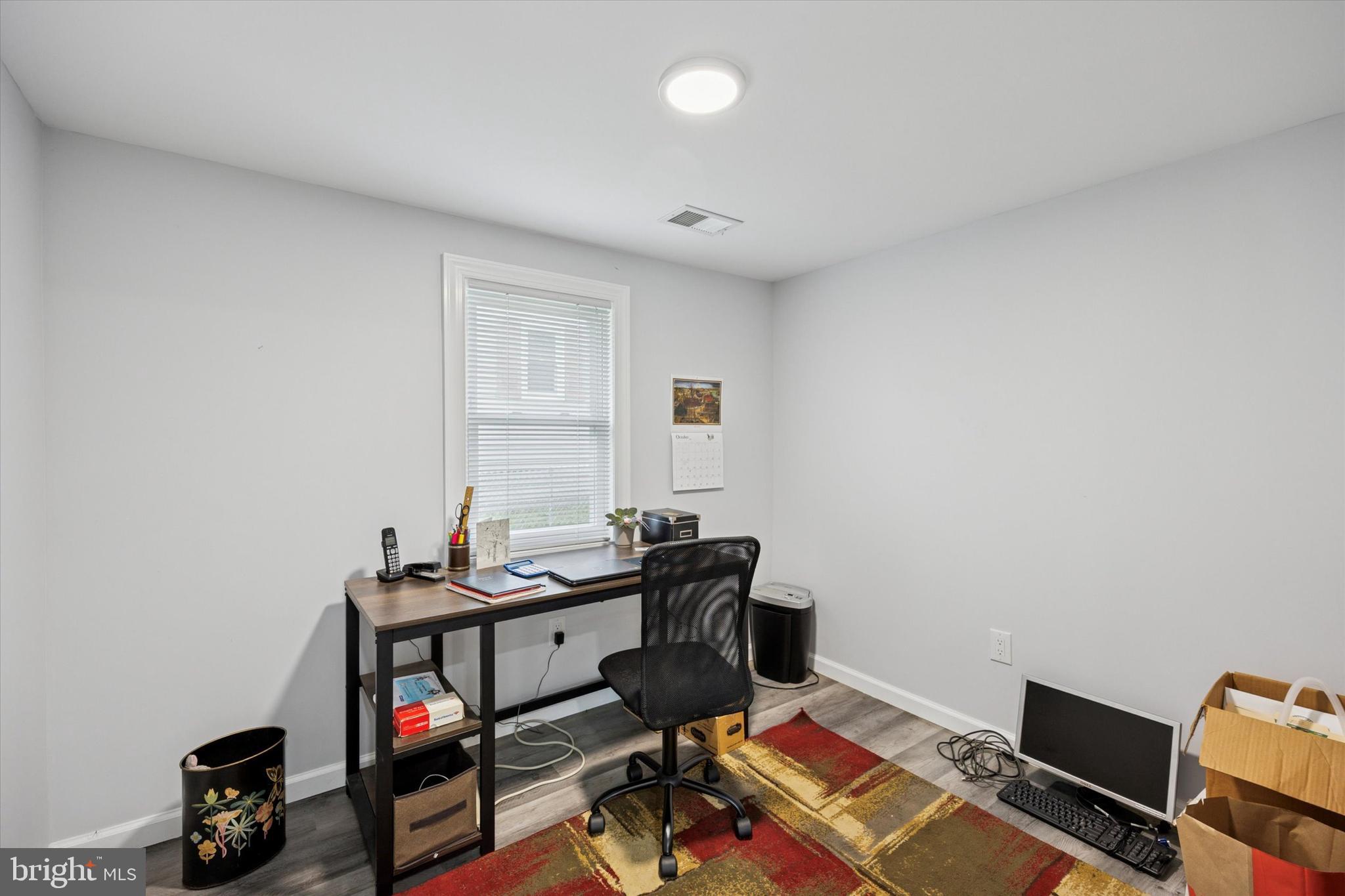 434 Sycamore Avenue Croydon, PA 19021 - Photo 14 of 26 a view of a workspace with furniture and a window