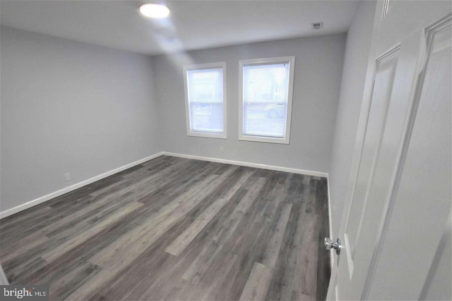 434 Sycamore Avenue Croydon, PA 19021 - Photo 15 of 26 wooden floor in an empty room with a window