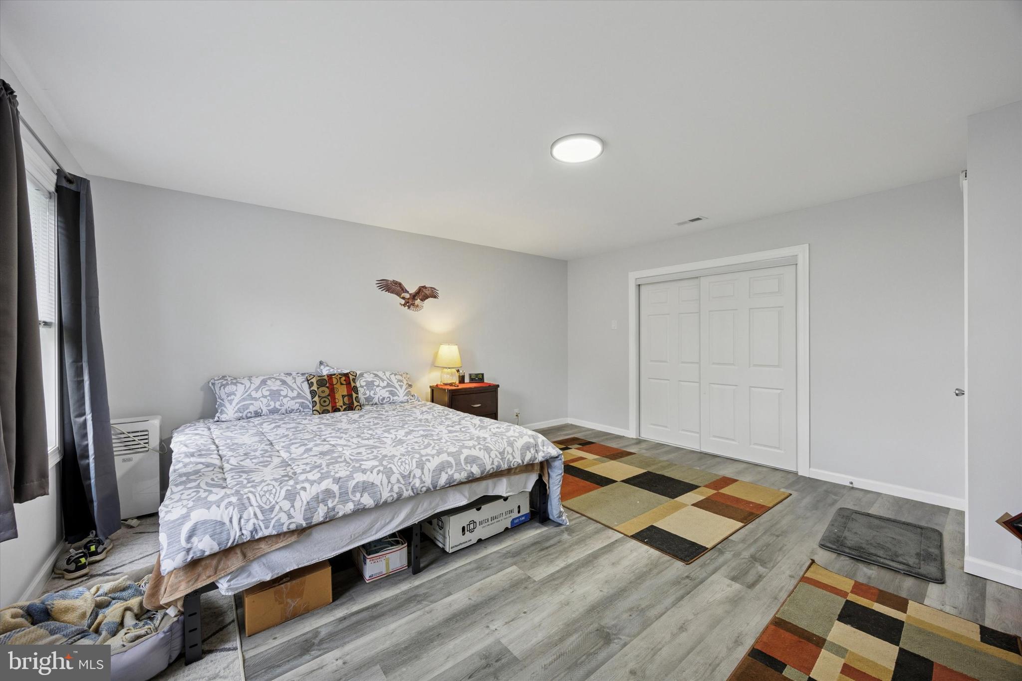 434 Sycamore Avenue Croydon, PA 19021 - Photo 17 of 26 a bedroom with a bed and wooden floor