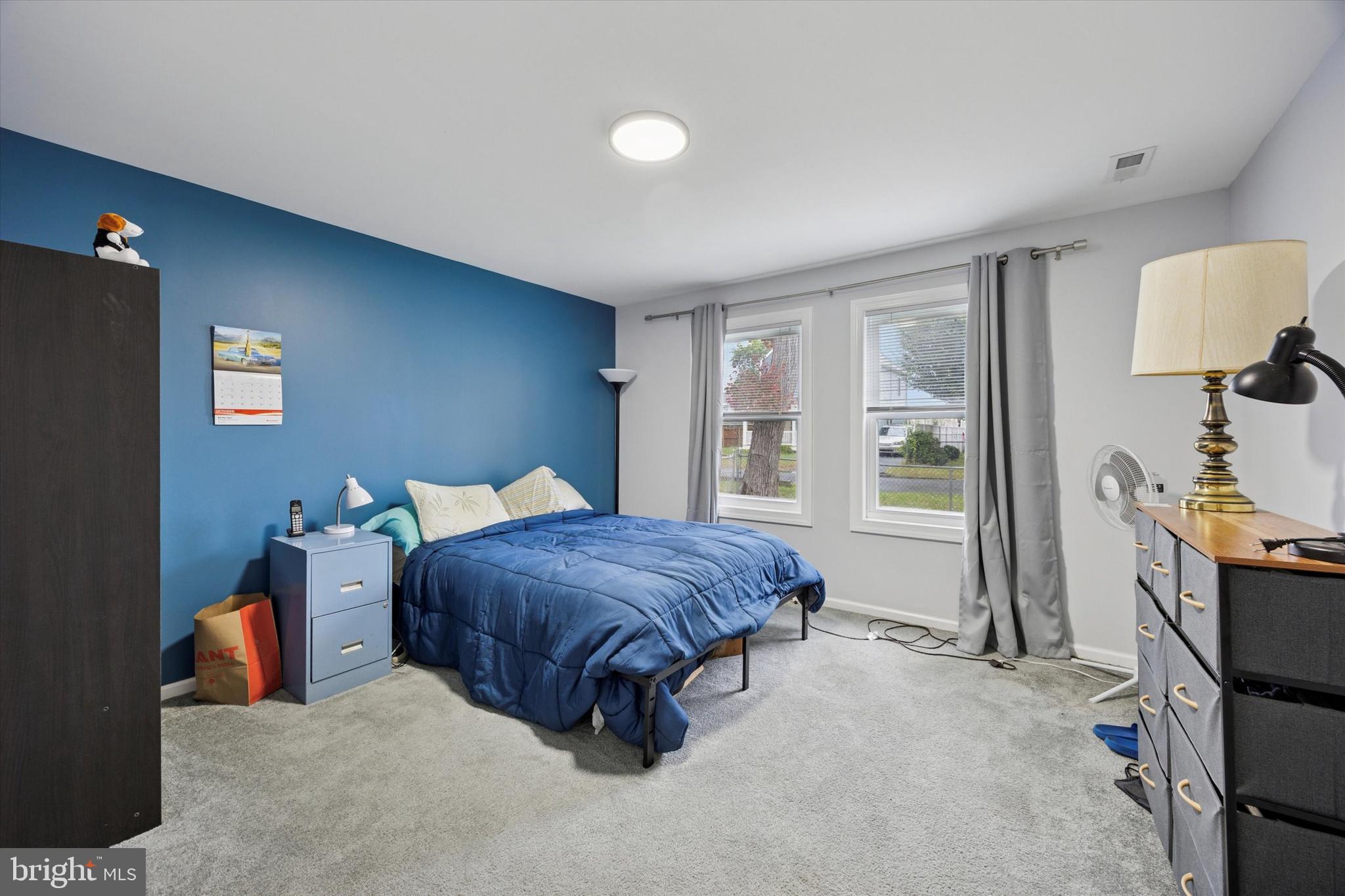 434 Sycamore Avenue Croydon, PA 19021 - Photo 20 of 26 a living room with a bed furniture and a window