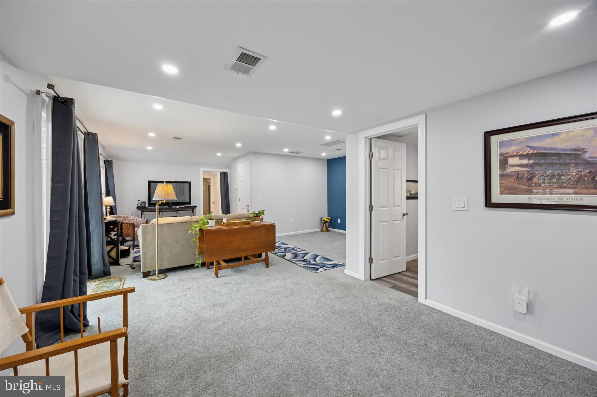 434 Sycamore Avenue Croydon, PA 19021 - Photo 4 of 26 a living room with furniture and a refrigerator