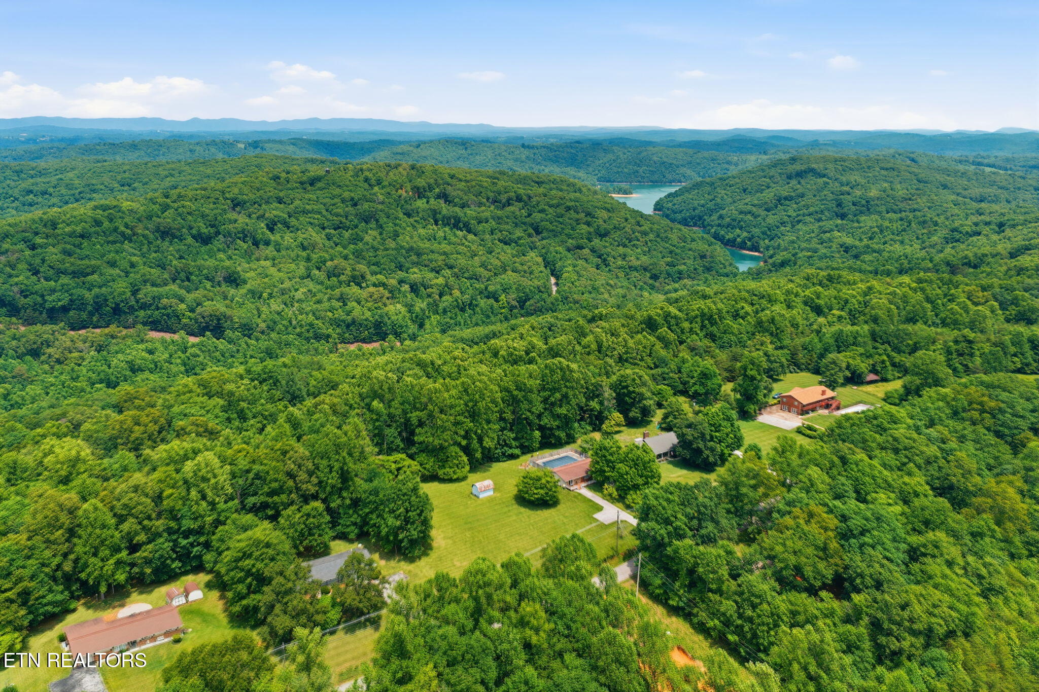 815 Stephens Road Rocky Top, TN 37769 - Photo 5 of 33 50-web-or-mls-DJI_20260529134728_0430_D