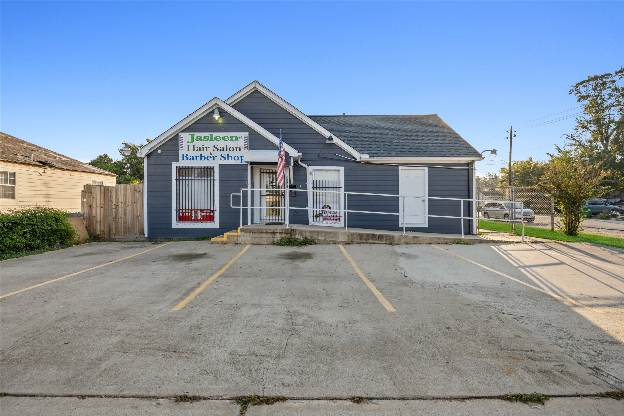 a view of a house with a yard and garage