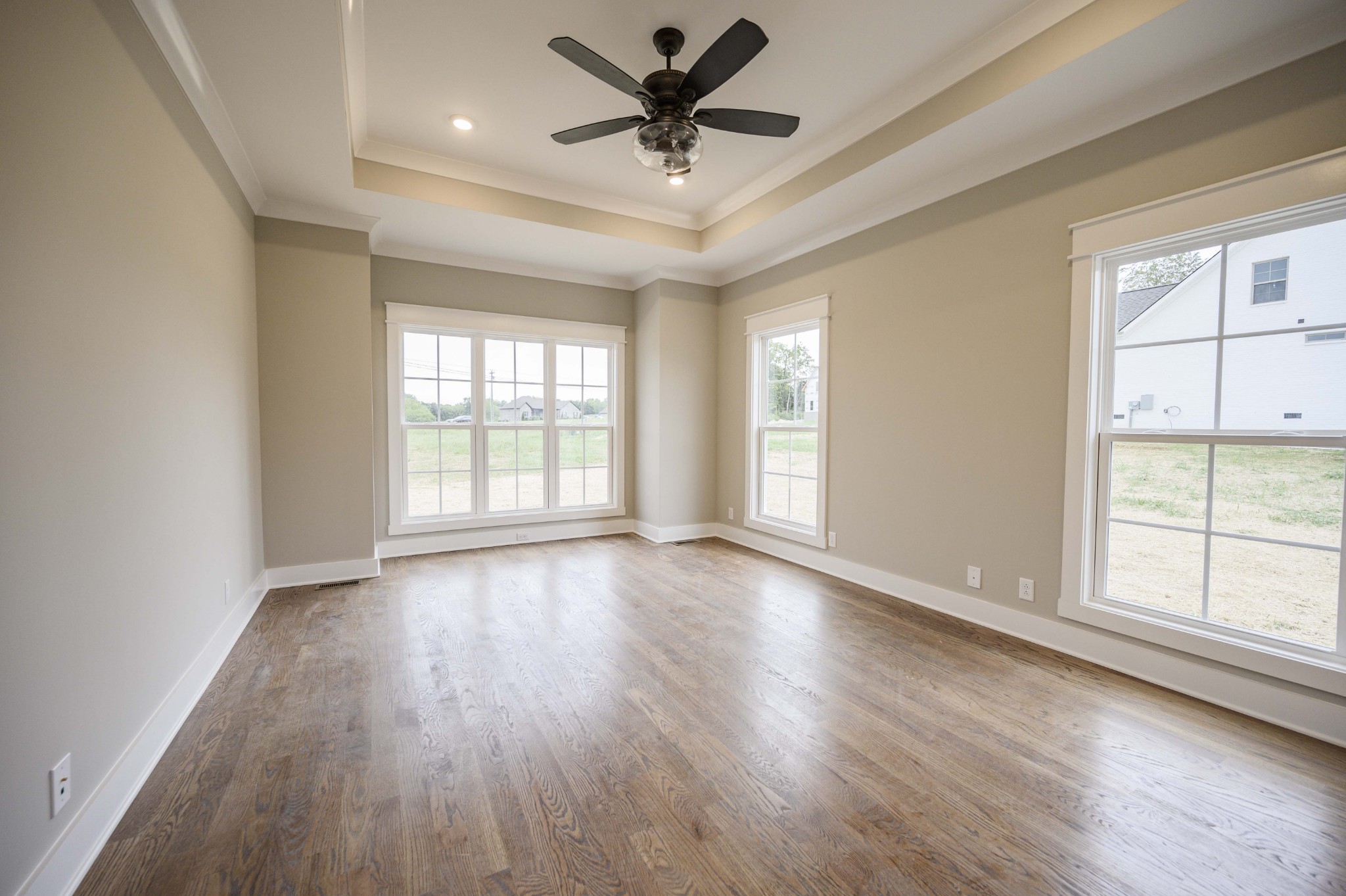 11801 North Milton Road Milton, TN 37118 - Photo 24 of 48 a view of empty room with wooden floor and fan