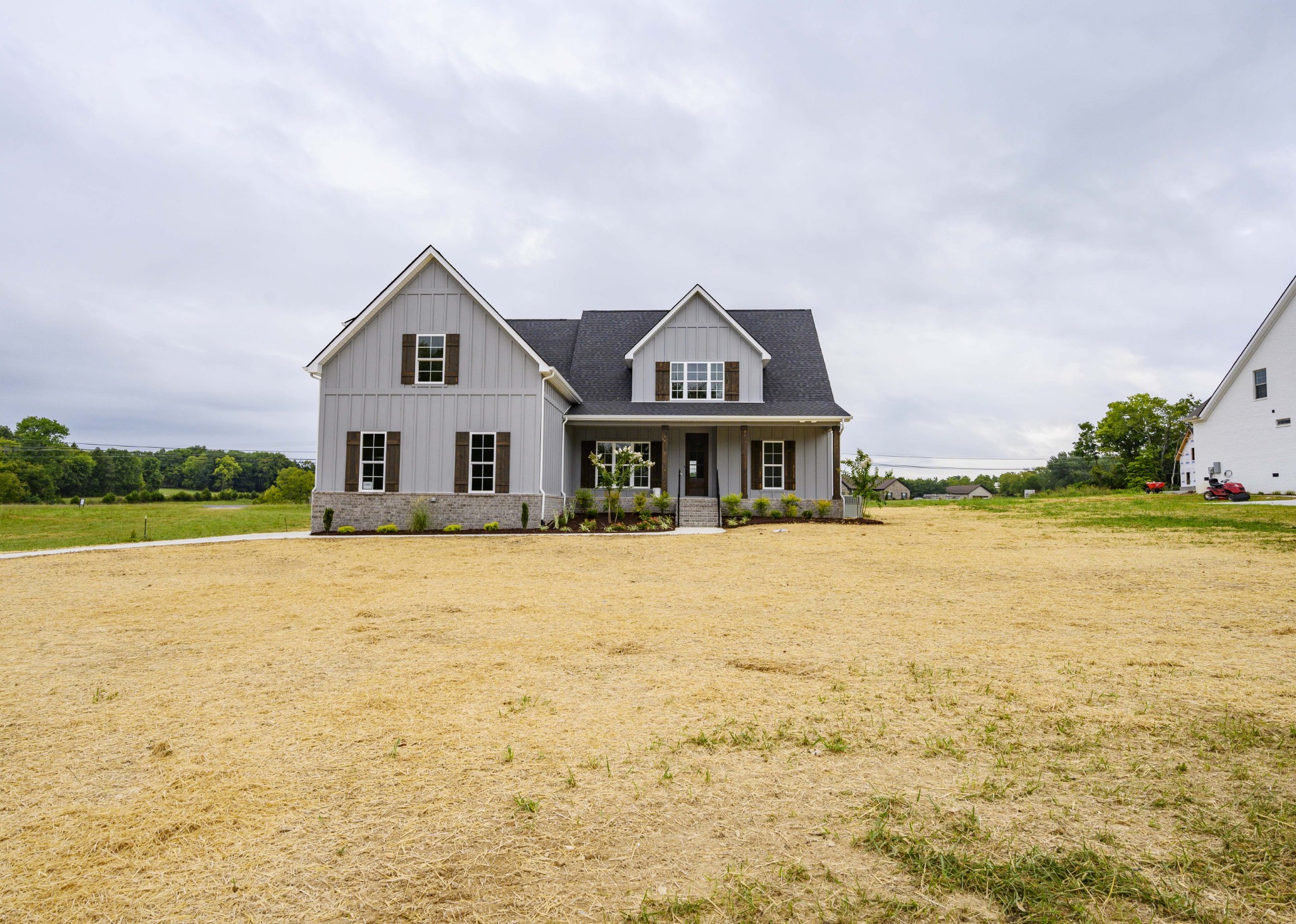 11801 North Milton Road Milton, TN 37118 - Photo 4 of 48 a front view of a house with a yard
