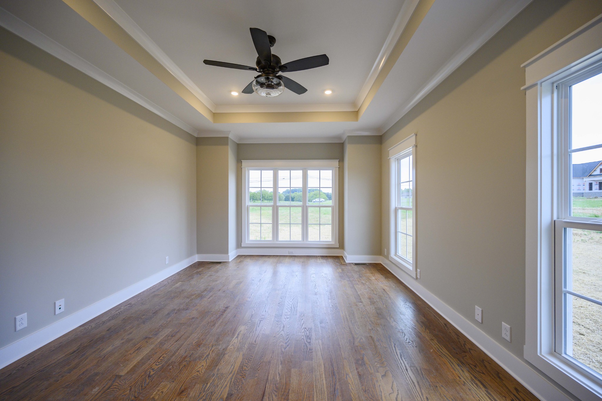 11801 North Milton Road Milton, TN 37118 - Photo 31 of 48 a view of an empty room with wooden floor and a window