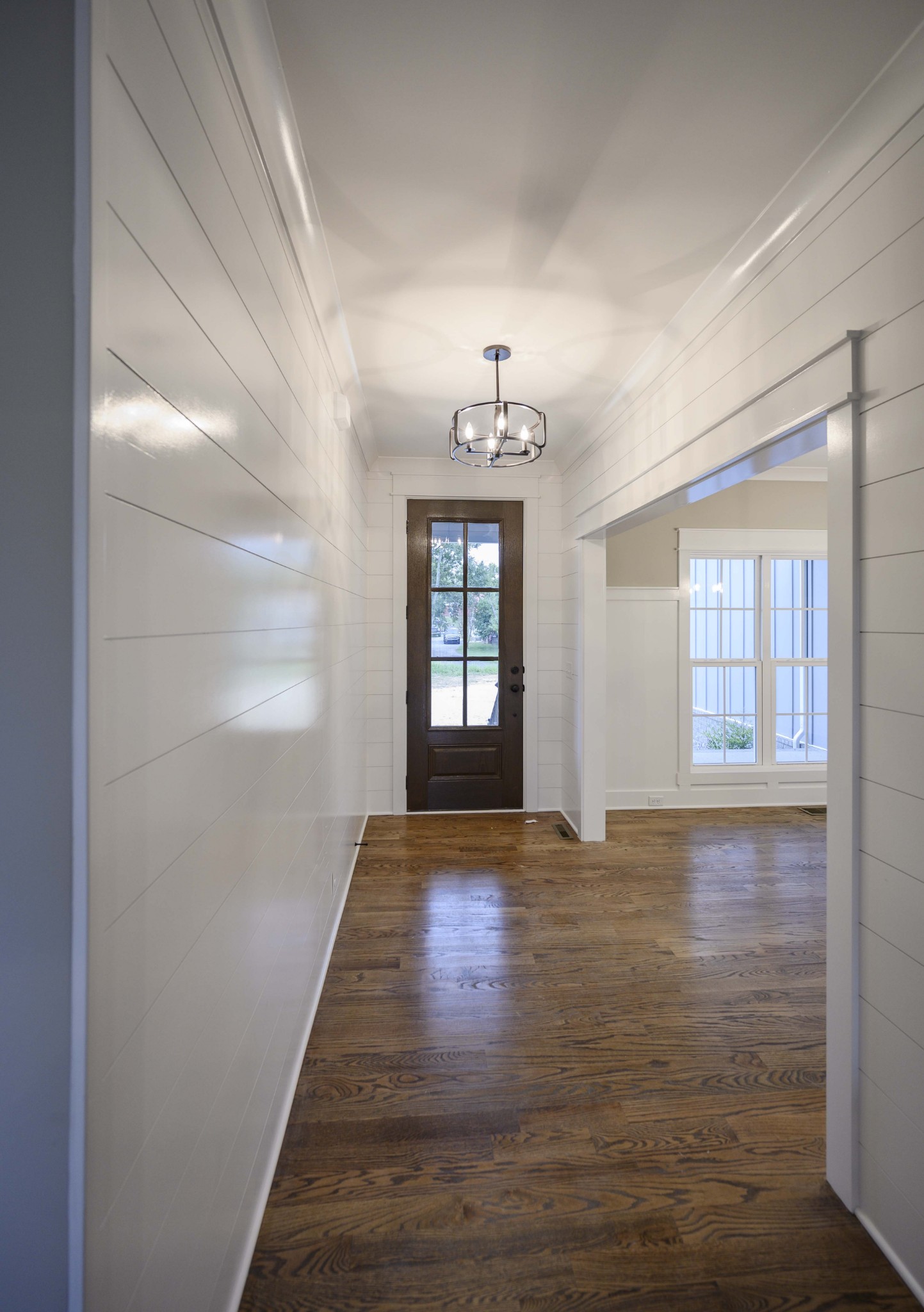 11801 North Milton Road Milton, TN 37118 - Photo 5 of 48 a view of an empty room with wooden floor and a window
