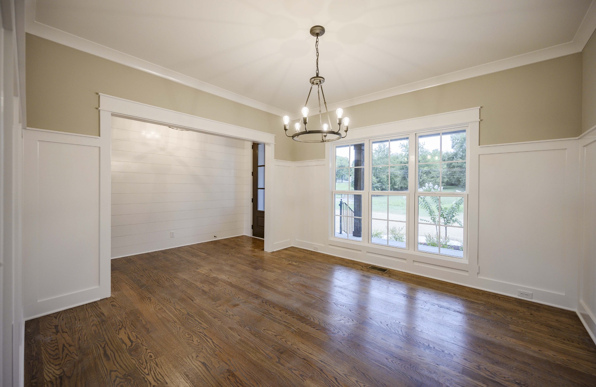 11801 North Milton Road Milton, TN 37118 - Photo 7 of 48 a view of an empty room with wooden floor and a window