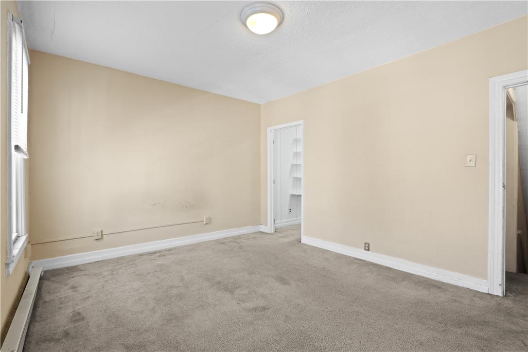 431 Pierce Street Bethlehem, PA 18015 - Photo 14 of 27 Comfortable carpeting underfoot creates a welcoming and adaptable interior space.