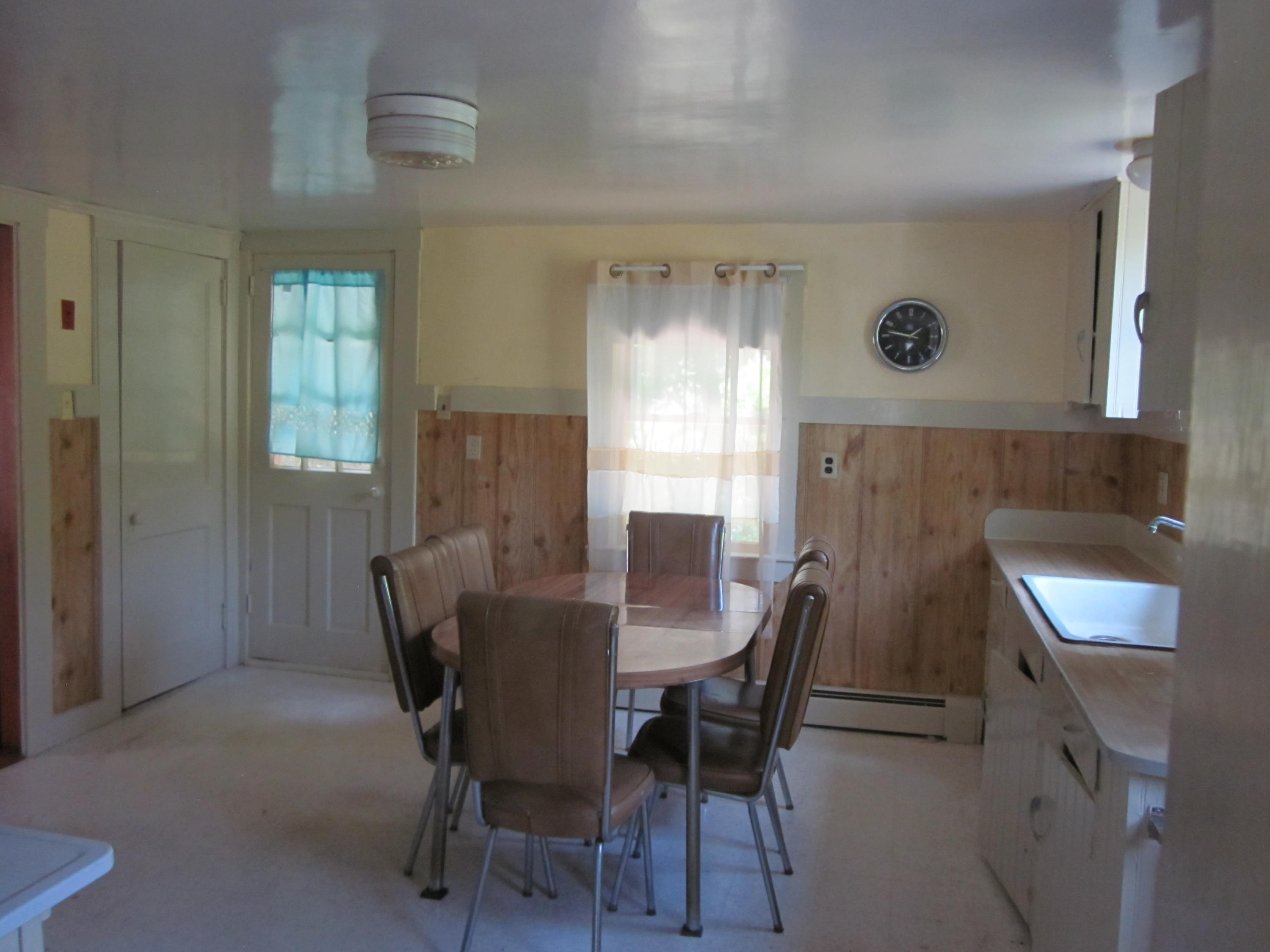 81 Shore Road Truro, MA 02666 - Photo 4 of 11 a view of a dining room with furniture and window