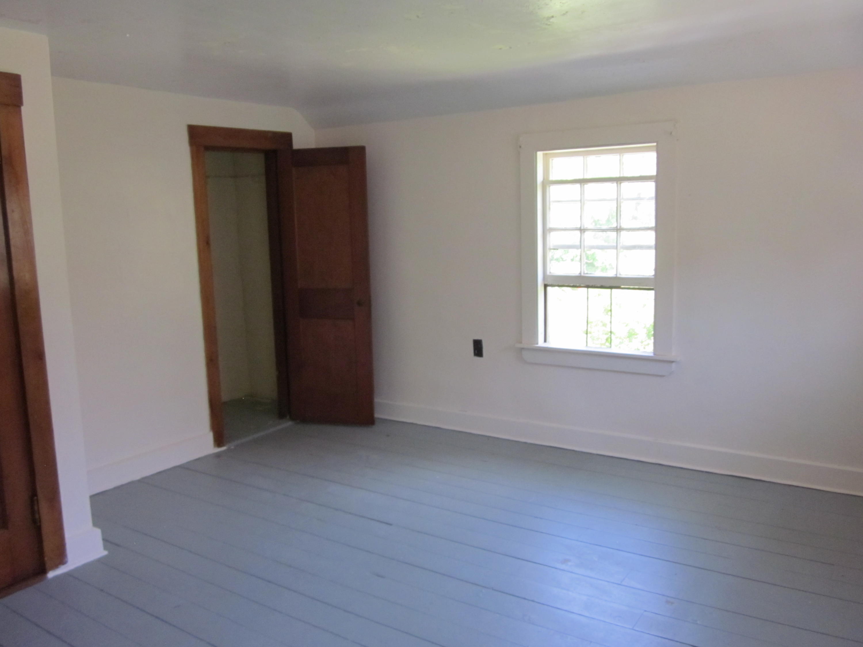 81 Shore Road Truro, MA 02666 - Photo 7 of 11 an empty room with windows and closet