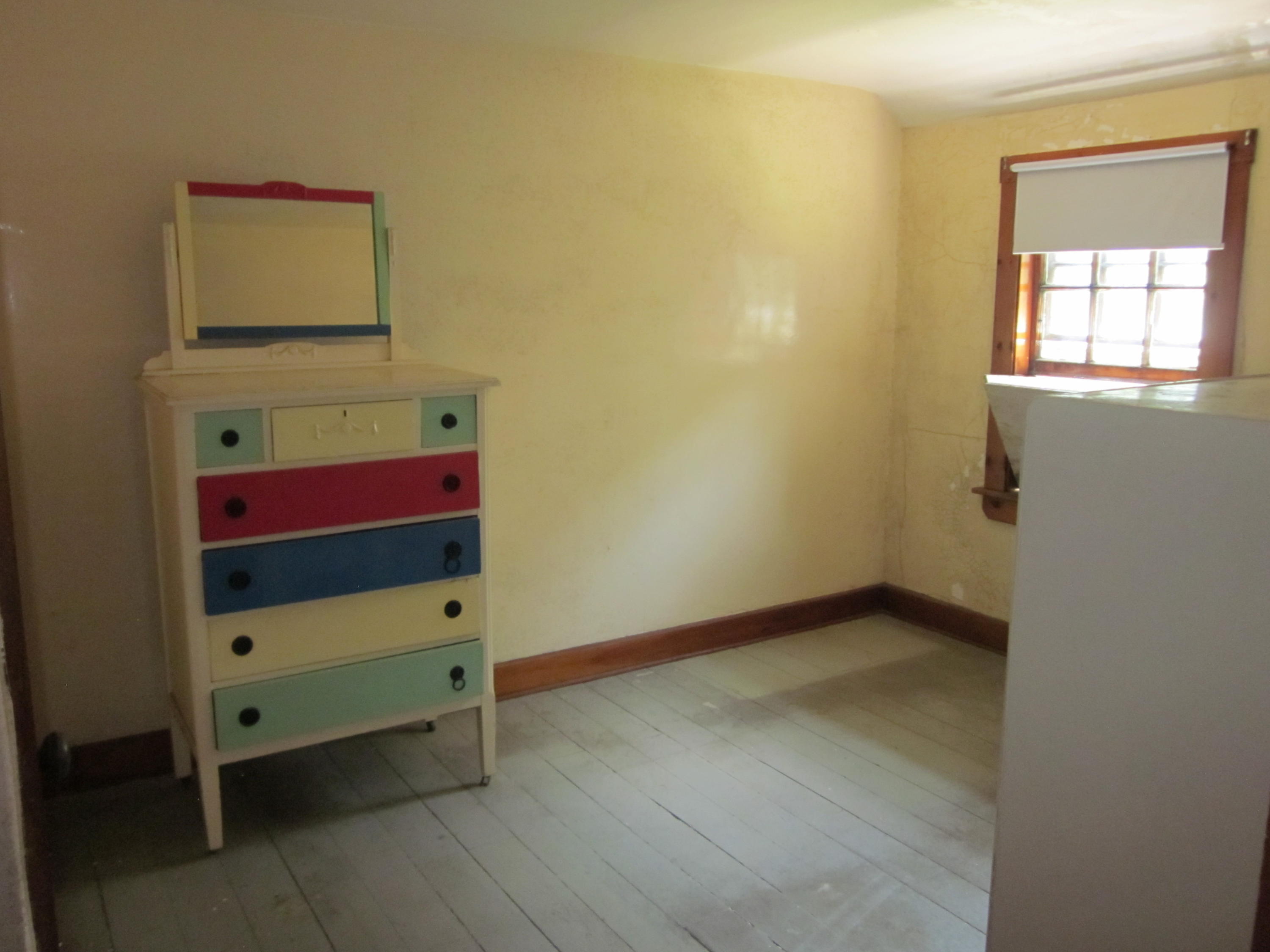 81 Shore Road Truro, MA 02666 - Photo 10 of 11 a view of room with baby crib and dresser