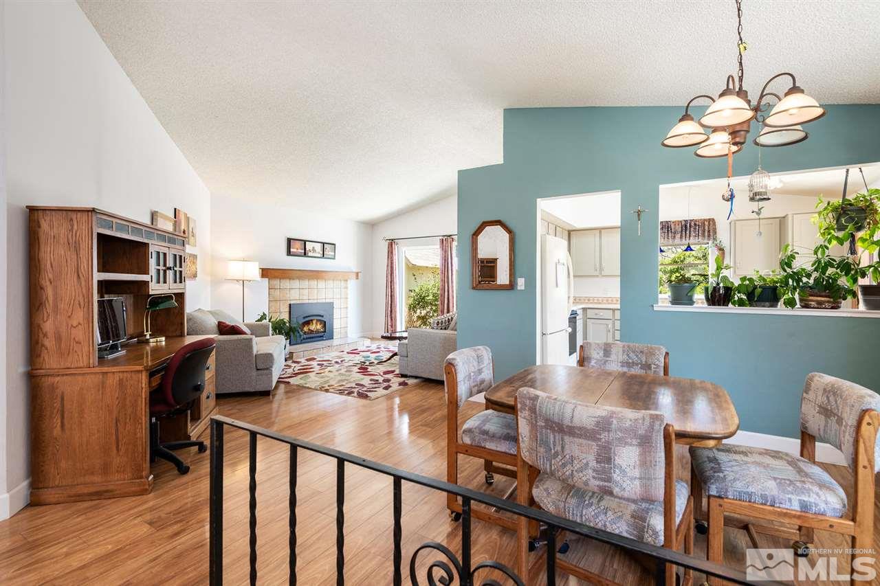 1316 Canyon Creek Road Reno, NV 89523 - Photo 3 of 17 a view of a dining room with furniture window and wooden floor