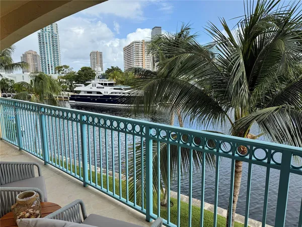 a view of a balcony with plants