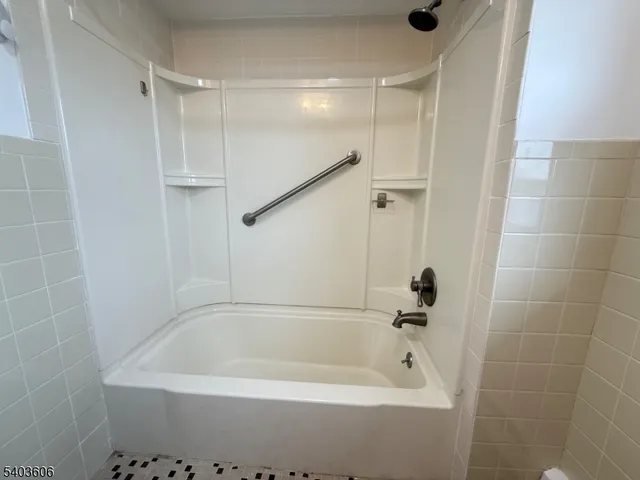 a bathroom with a bathtub