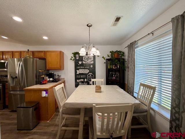 544 20th Street Delta, CO 81416 - Photo 6 of 44 a view of a dining room with furniture