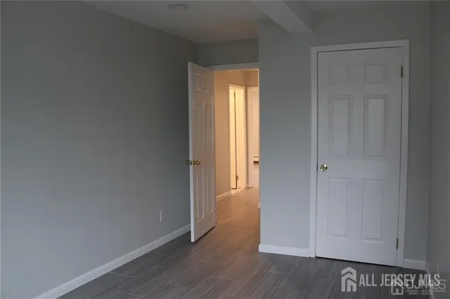 a bathroom with a toilet and a bath tub